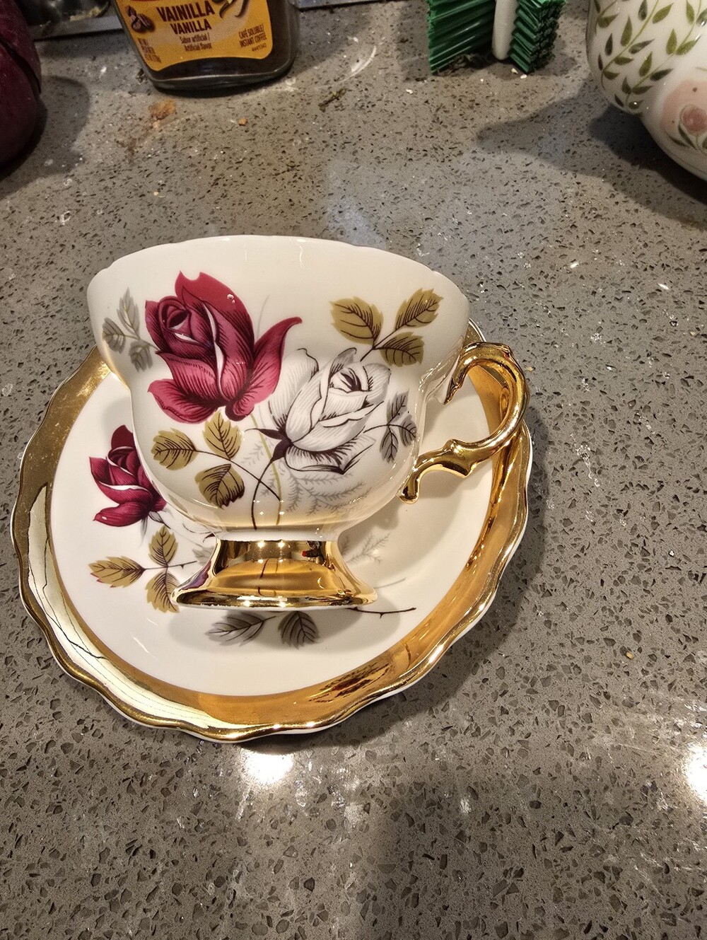 Gold-Trim Porcelain Teacup & Saucer with Rose Motif - White and Pink